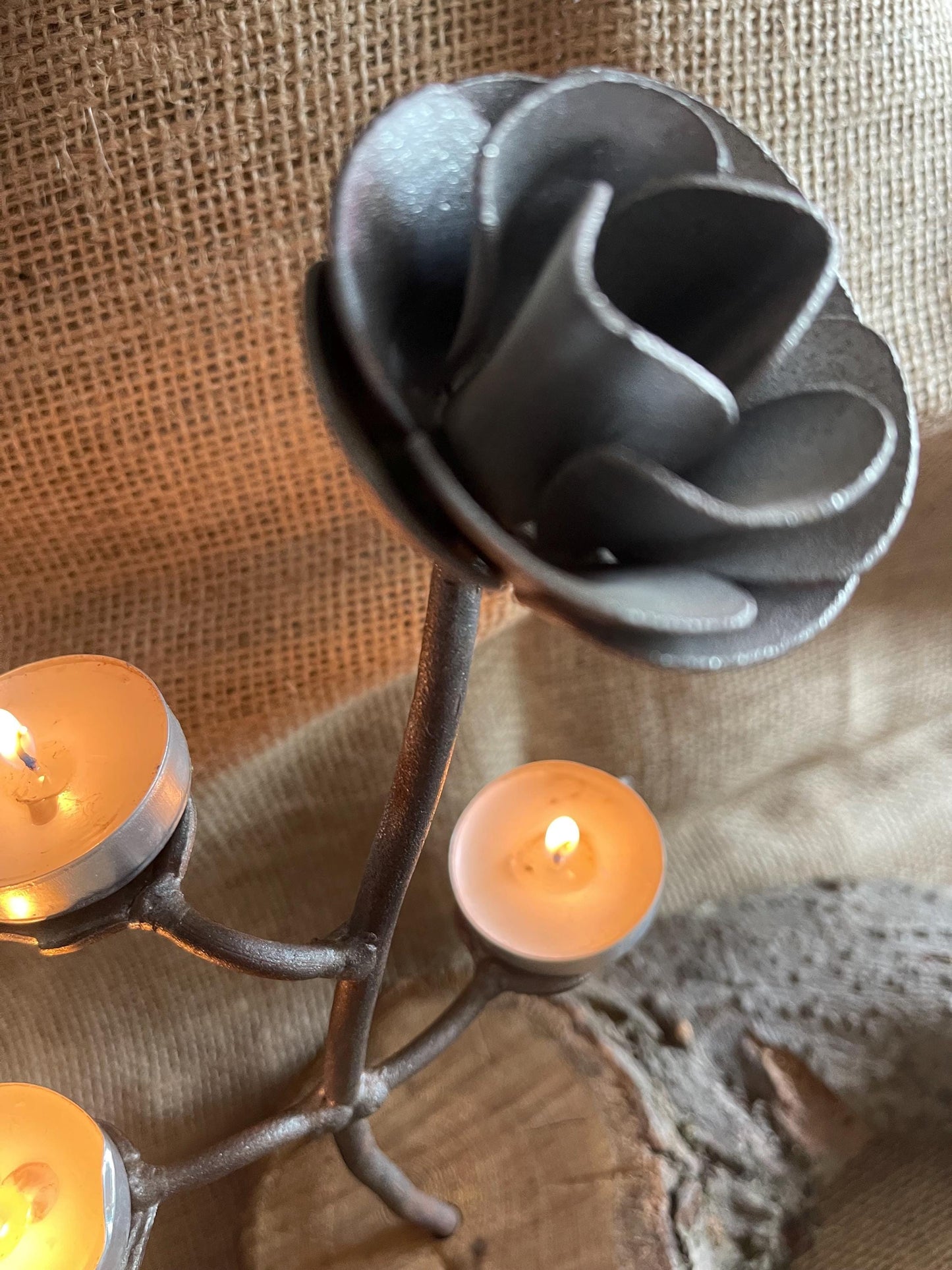 Wrought Iron rose table top tea light holder set in wooden base. Wedding table decoration